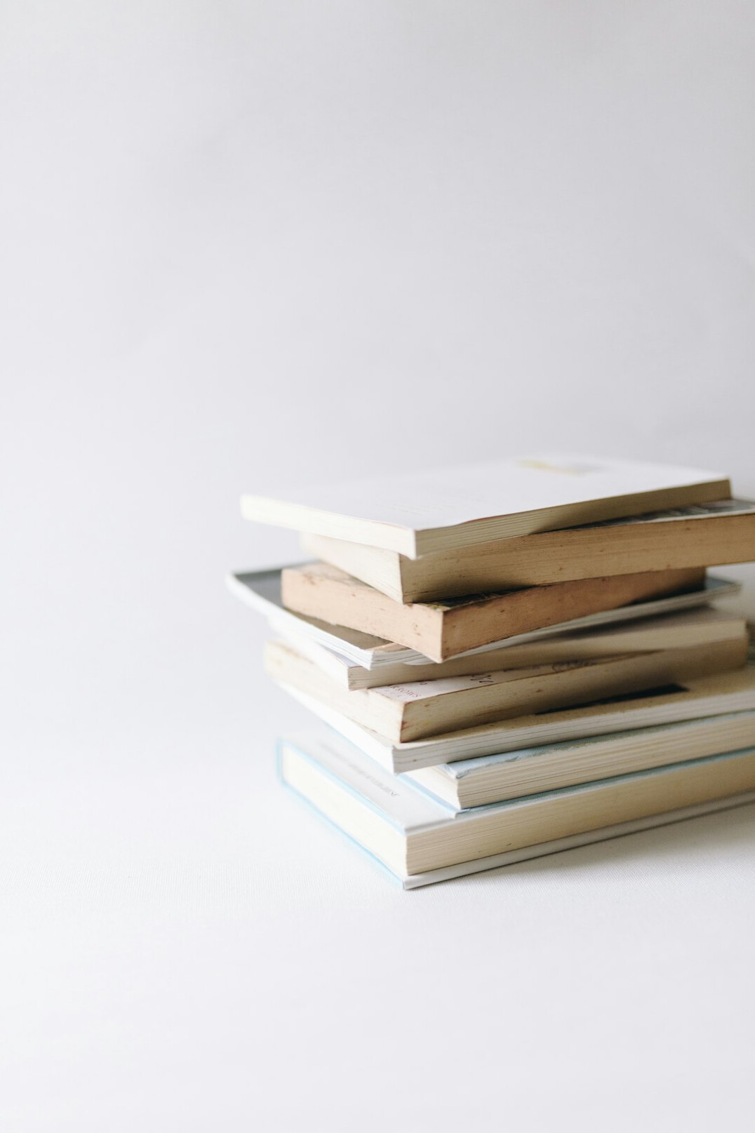 stack of self help books