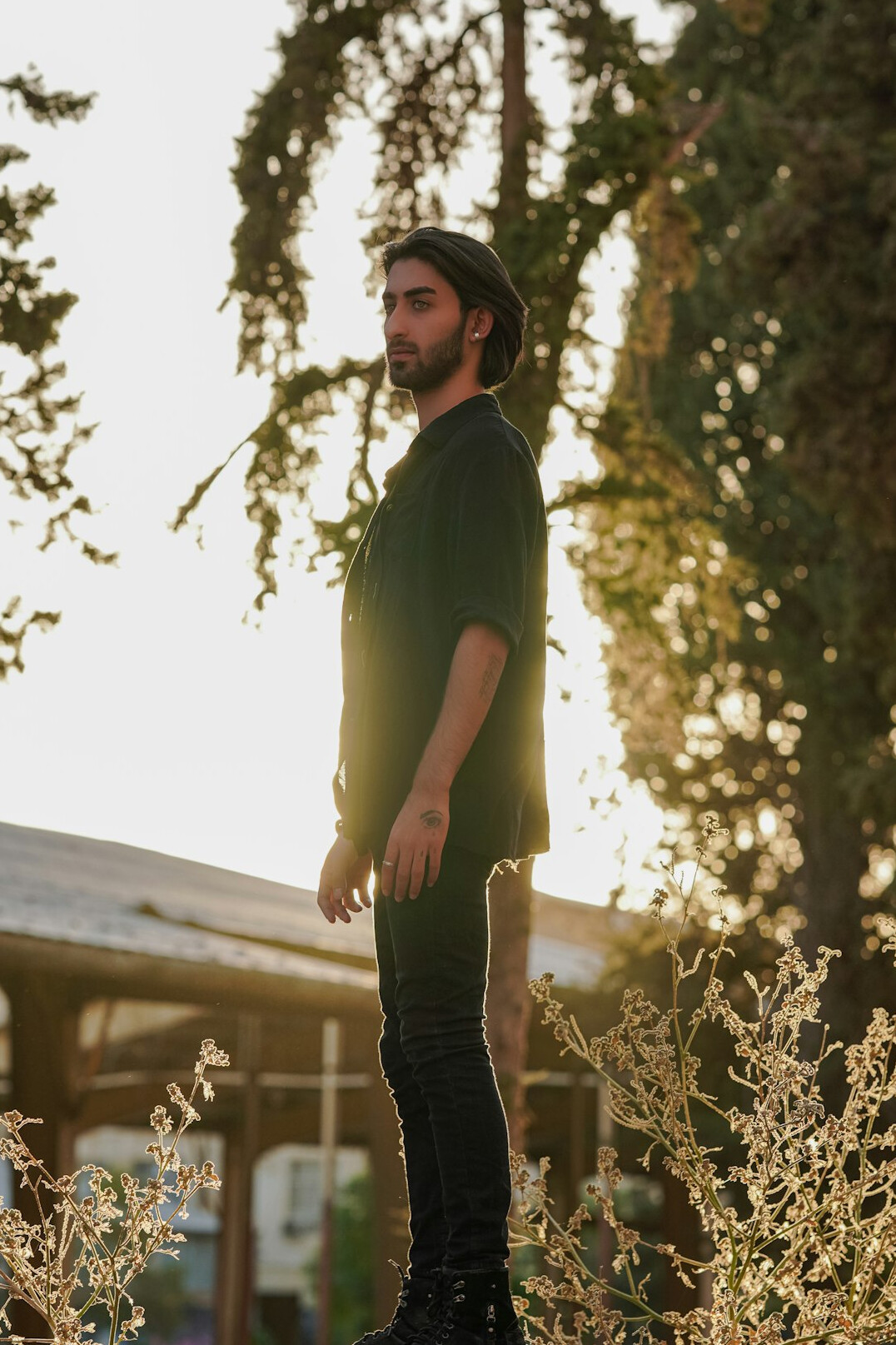 confident person standing tall outdoors