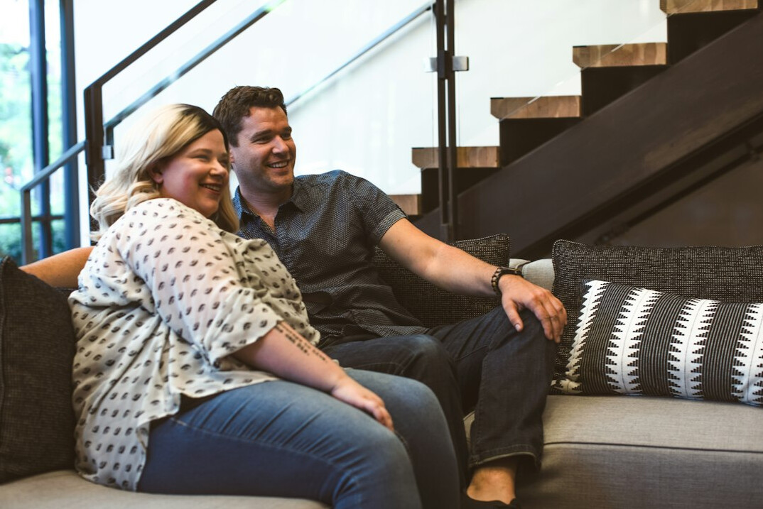 couple talking on couch